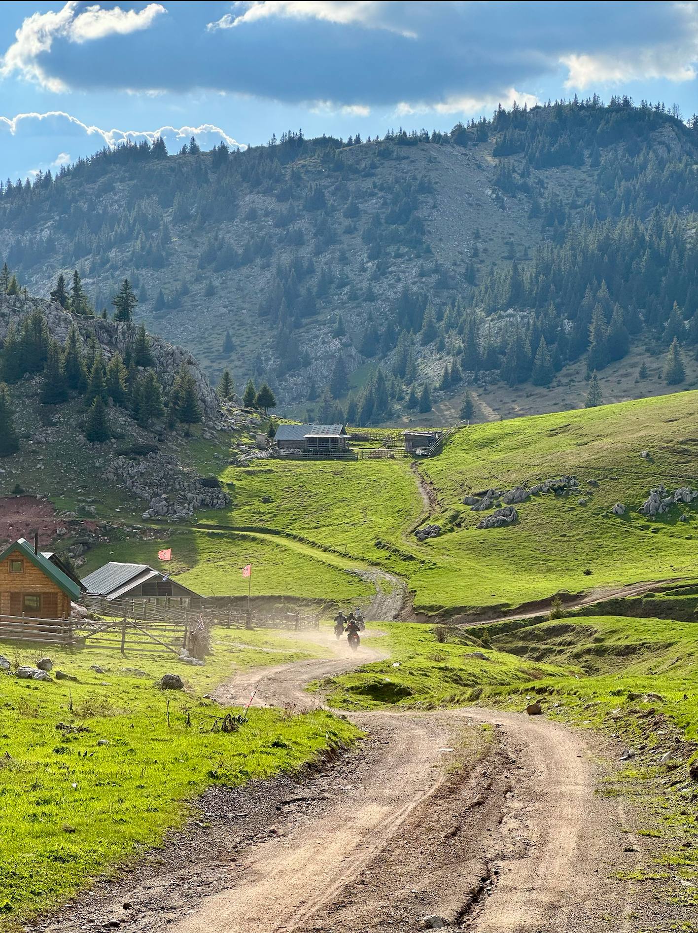 Riders on custom off-road route through Kosovo mountain valley — Tailor Made private tour